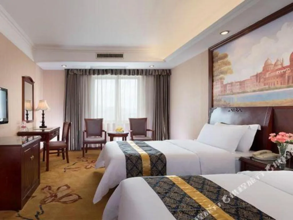 Bed in Vienna Hotel Nanning Train Station