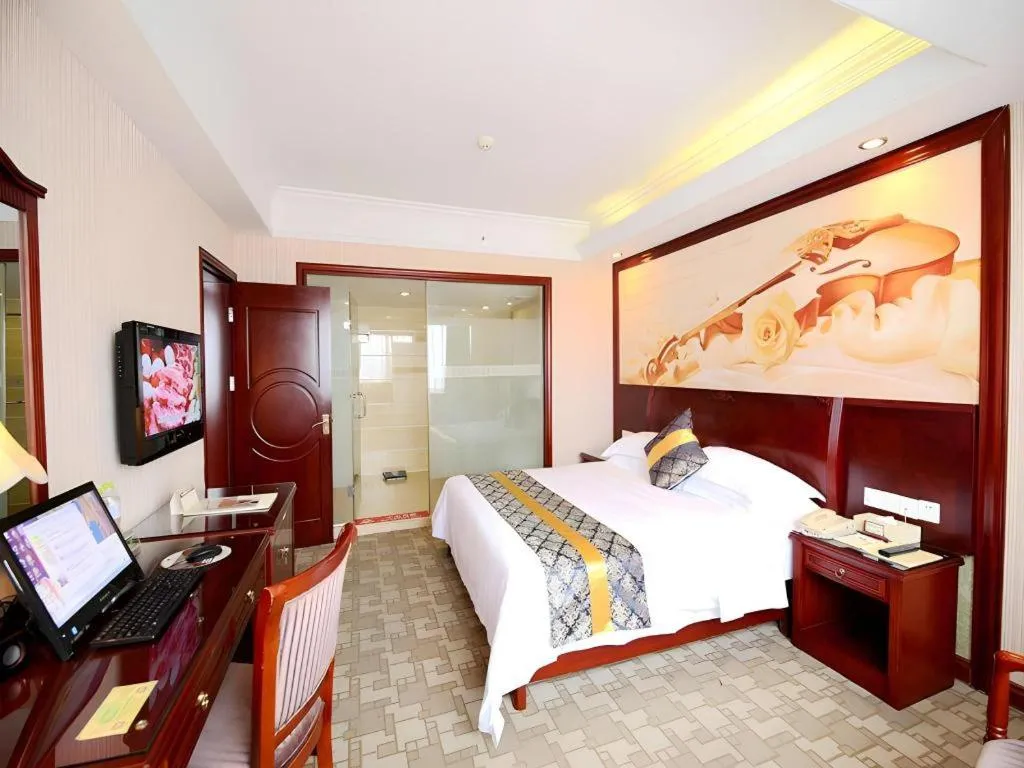 Bed in Vienna Hotel Nanning Train Station