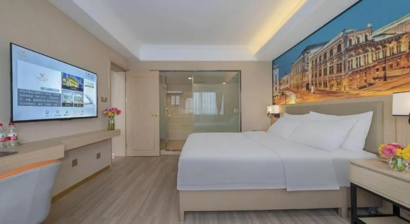 Bed in Vienna Hotel Nanning Train Station