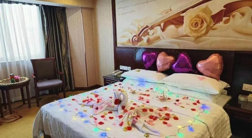 Bed in Vienna Hotel Nanning Train Station