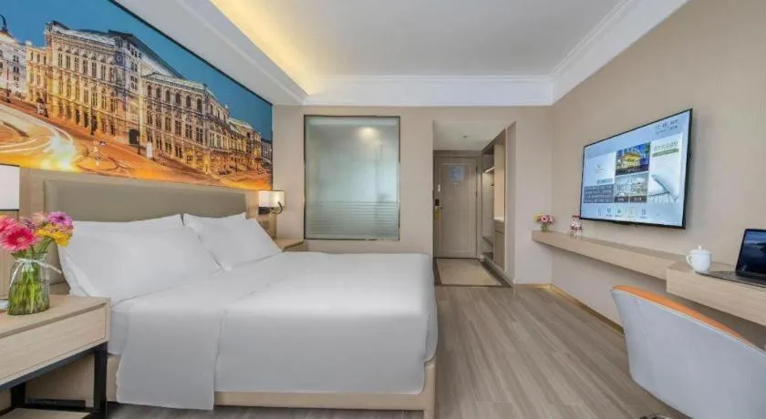 Bed in Vienna Hotel Nanning Train Station