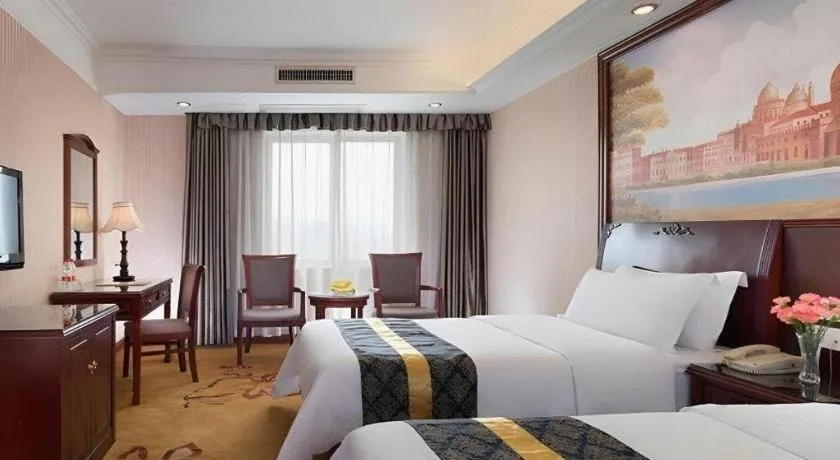 Bed in Vienna Hotel Nanning Train Station