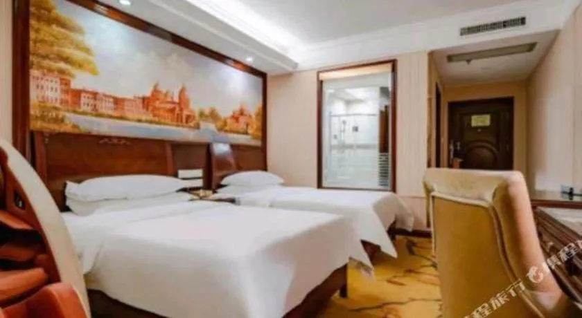 Bed in Vienna Hotel Nanning Train Station