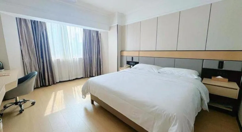 Bed in Vienna Hotel Nanning Train Station