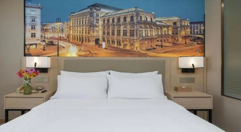 Bed in Vienna Hotel Nanning Train Station