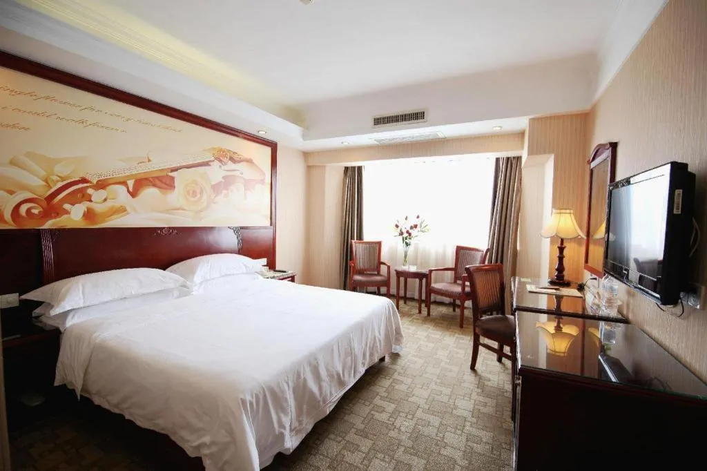 Bed in Vienna Hotel Nanning Train Station