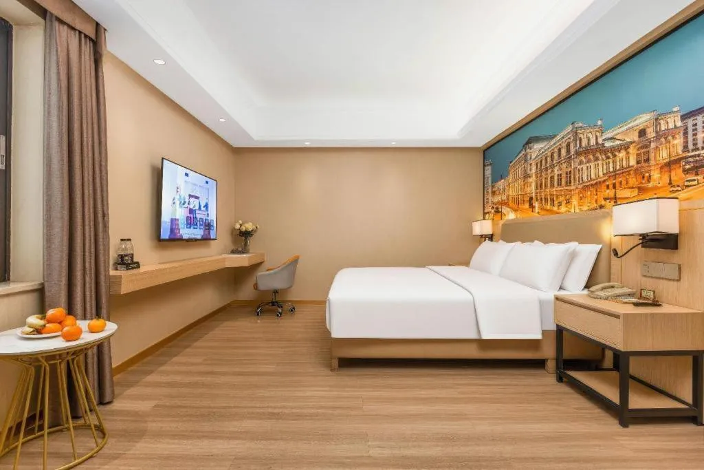 Bed in Vienna Hotel Nanning Train Station