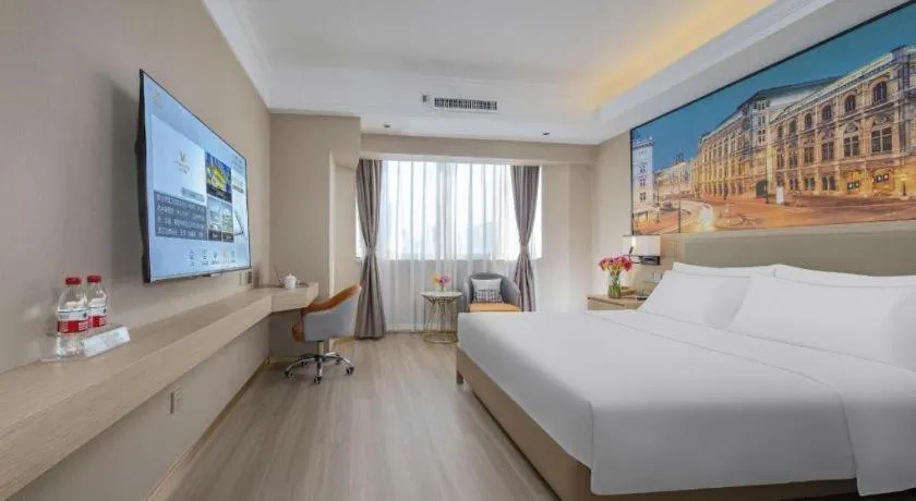 Bed in Vienna Hotel Nanning Train Station