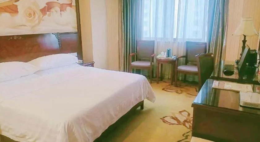 Bed in Vienna Hotel Nanning Train Station