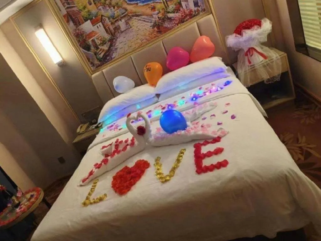 Bed in Vienna Hotel Nanning Train Station