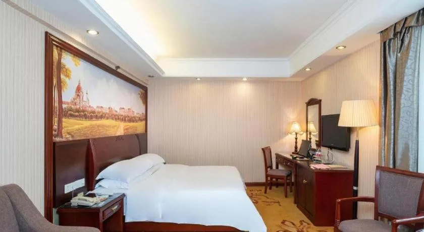 Bed in Vienna Hotel Nanning Train Station