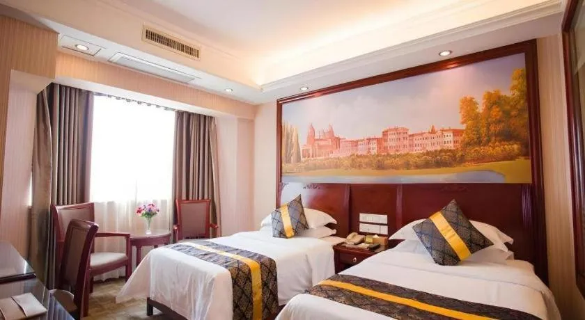 Bed in Vienna Hotel Nanning Train Station