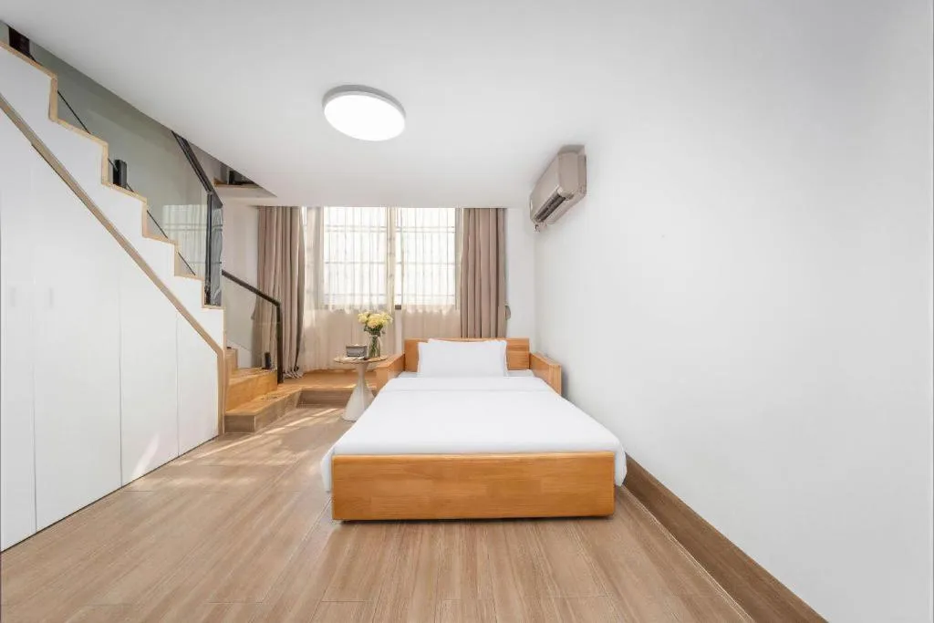 Bed in Vienna Hotel Nanning Train Station