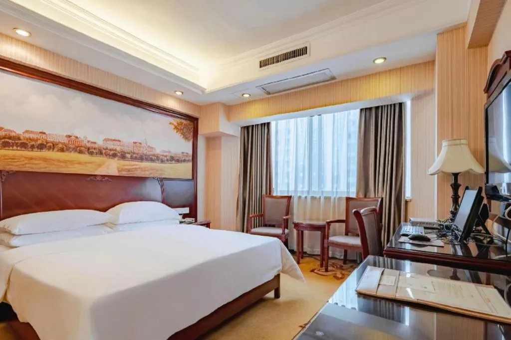 Bed in Vienna Hotel Nanning Train Station