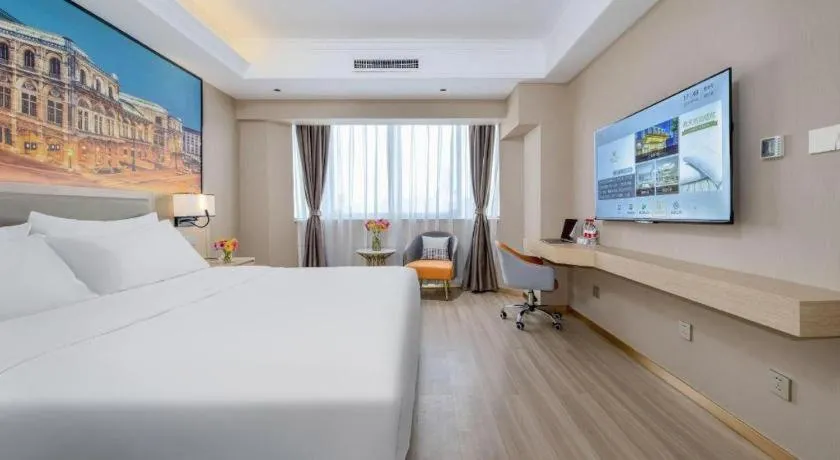 Bed in Vienna Hotel Nanning Train Station