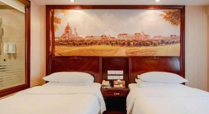 Bed in Vienna Hotel Nanning Train Station