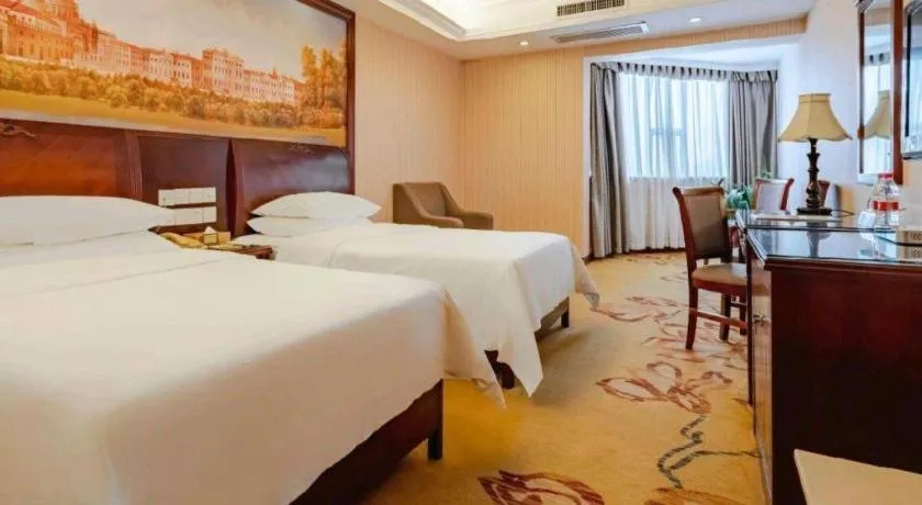 Bed in Vienna Hotel Nanning Train Station