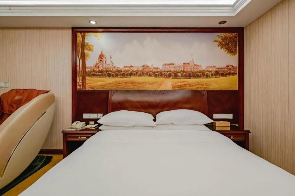Bed in Vienna Hotel Nanning Train Station