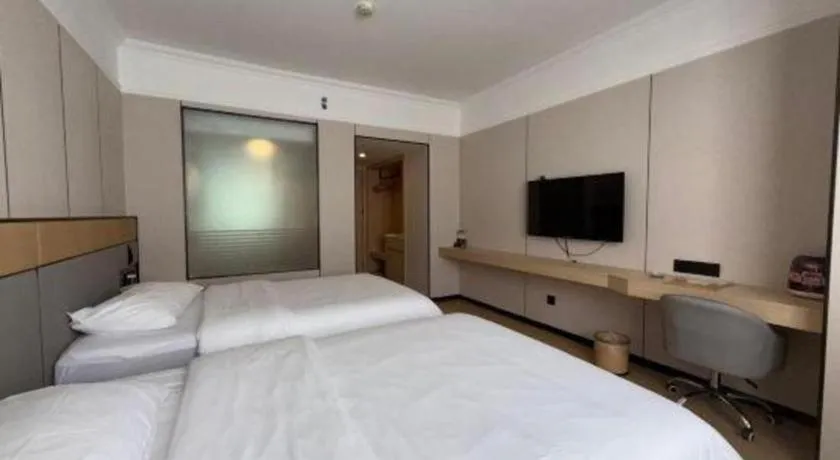 Bed in Vienna Hotel Nanning Train Station