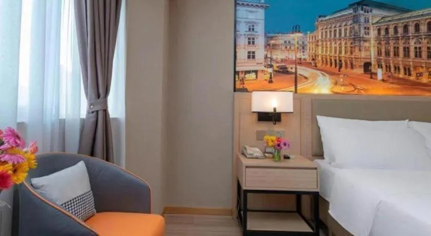 Bed in Vienna Hotel Nanning Train Station