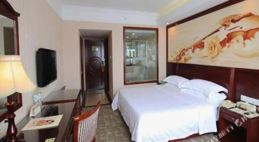 Bed in Vienna Hotel Nanning Train Station