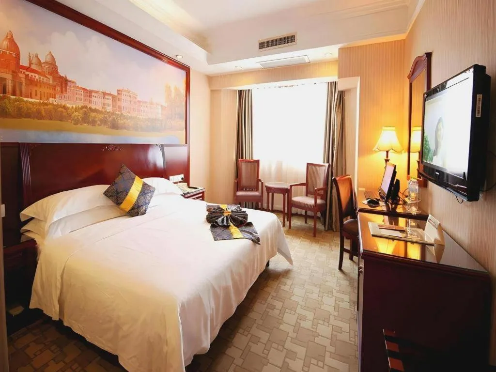 Bed in Vienna Hotel Nanning Train Station