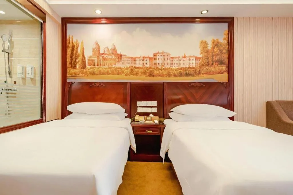 Bed in Vienna Hotel Nanning Train Station