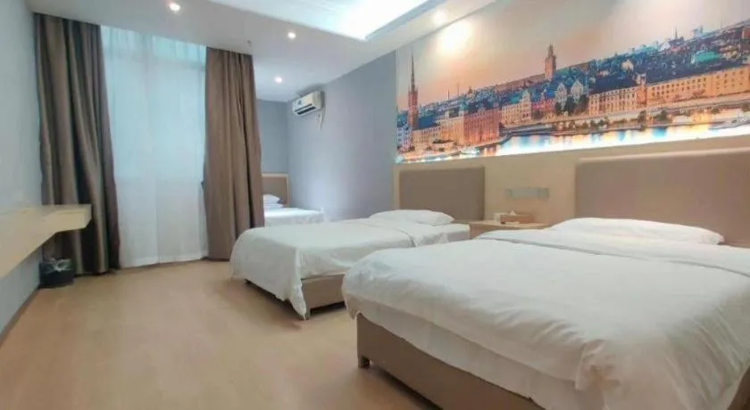 Bed in Vienna Hotel Nanning Train Station