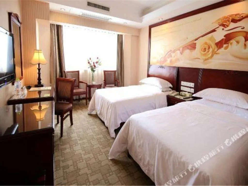 Bed in Vienna Hotel Nanning Train Station