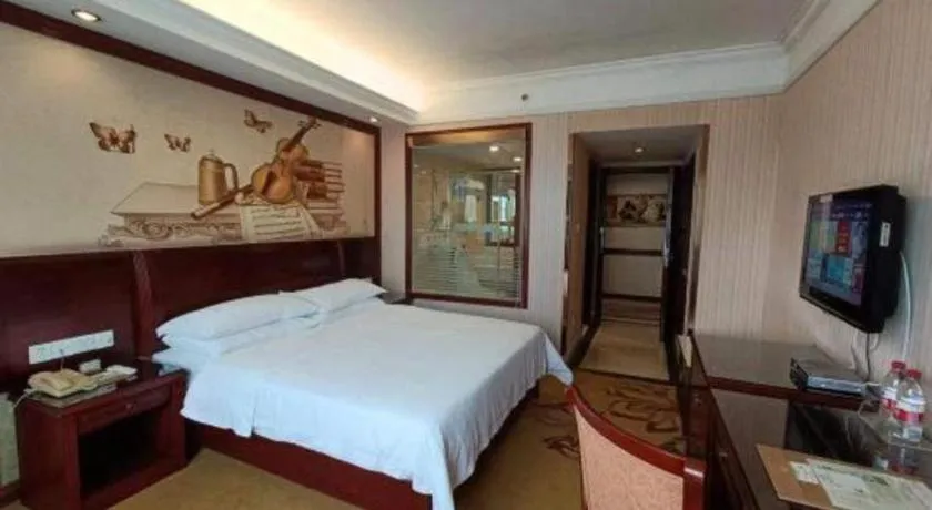 Bed in Vienna Hotel Nanning Train Station