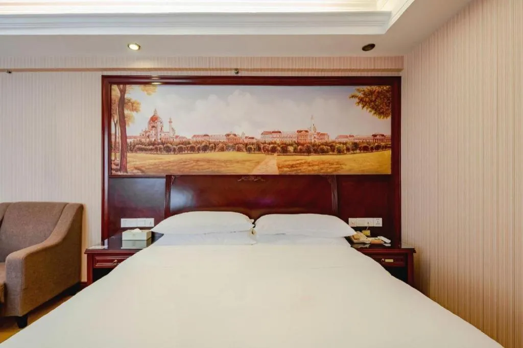 Bed in Vienna Hotel Nanning Train Station