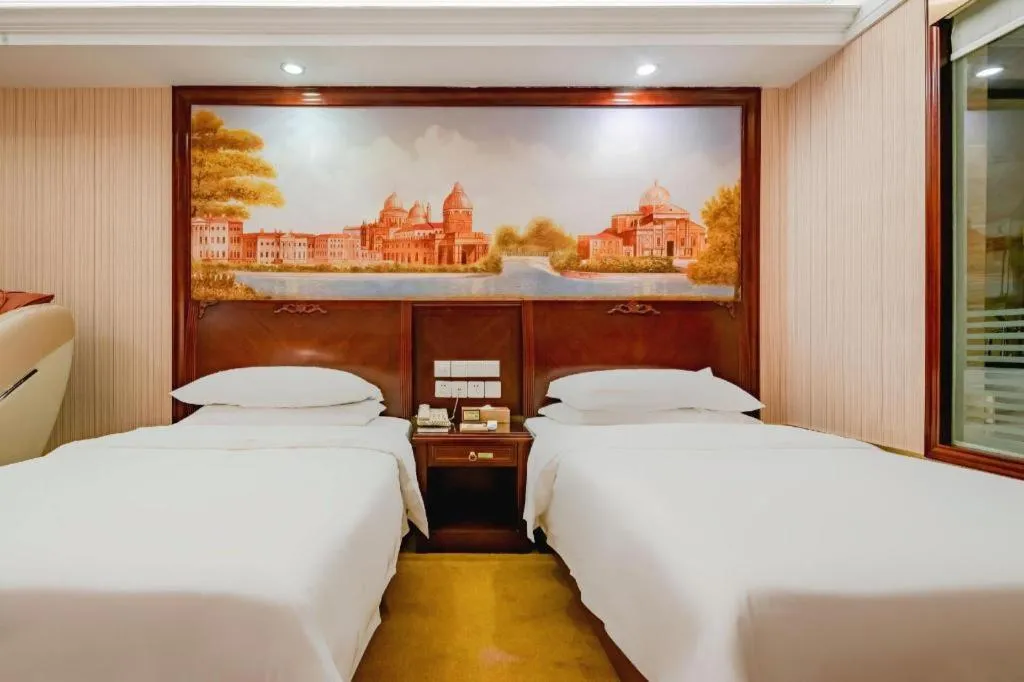 Bed in Vienna Hotel Nanning Train Station