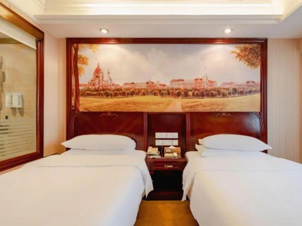 Bed in Vienna Hotel Nanning Train Station