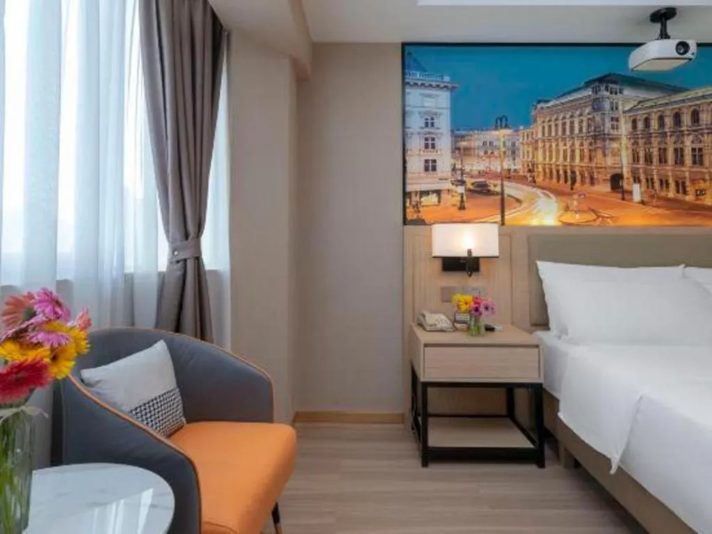 Bed in Vienna Hotel Nanning Train Station