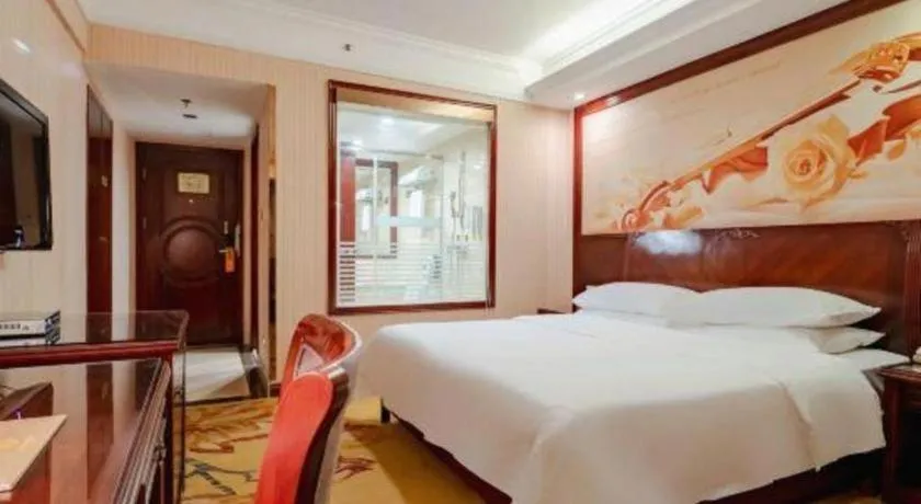 Bed in Vienna Hotel Nanning Train Station