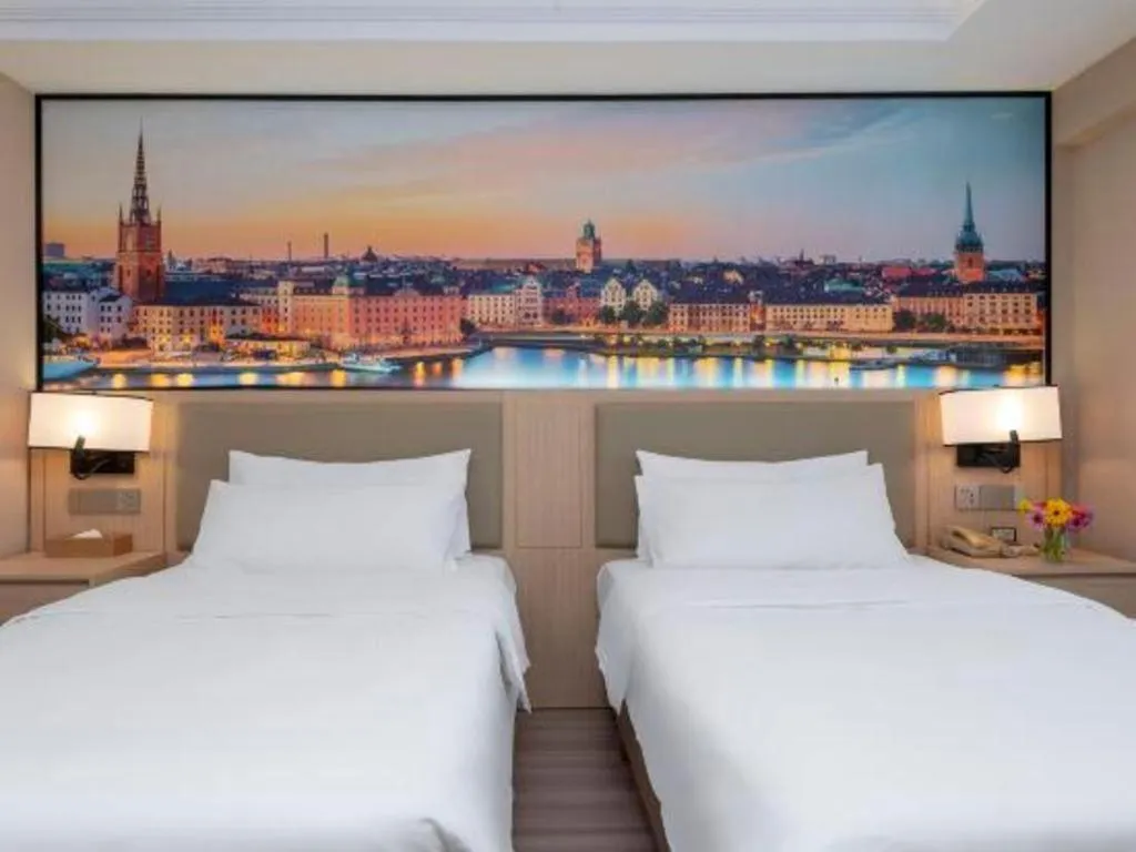 Bed in Vienna Hotel Nanning Train Station