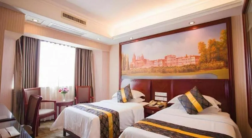 Bed in Vienna Hotel Nanning Train Station