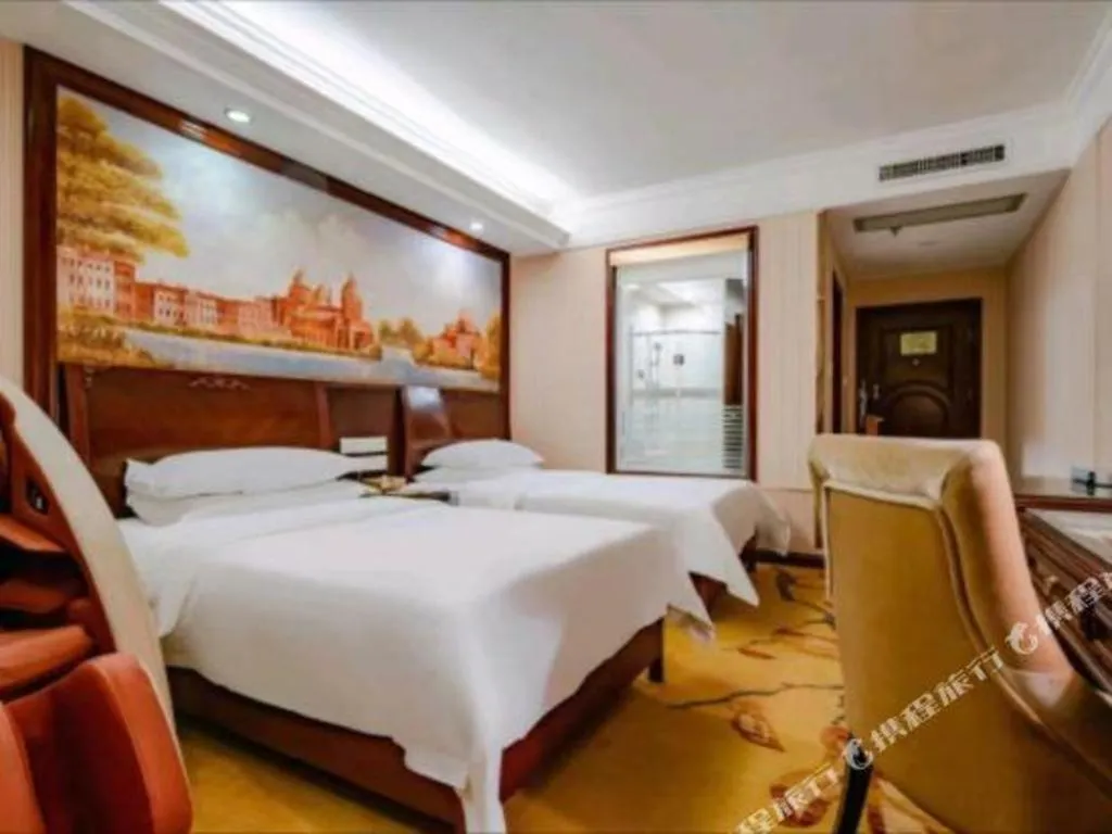 Bed in Vienna Hotel Nanning Train Station