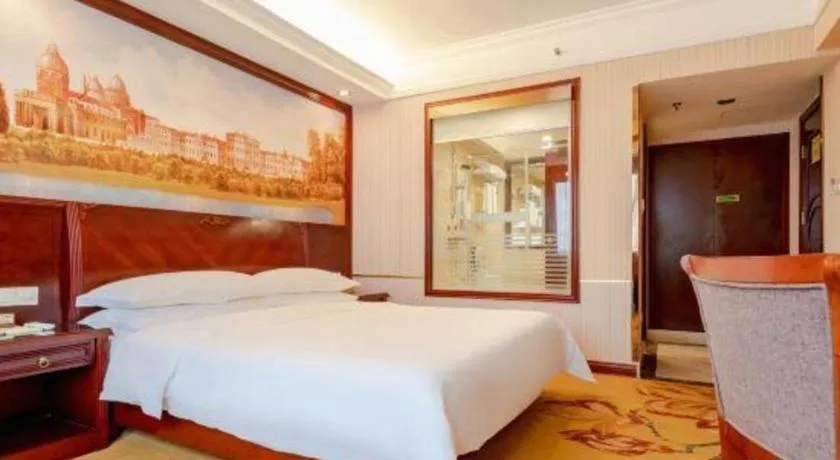 Bed in Vienna Hotel Nanning Train Station