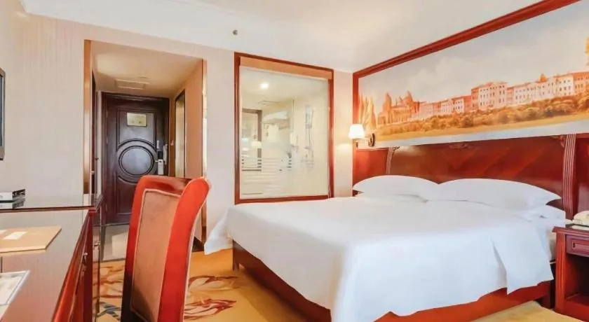 Bed in Vienna Hotel Nanning Train Station