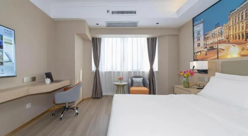 Bed in Vienna Hotel Nanning Train Station