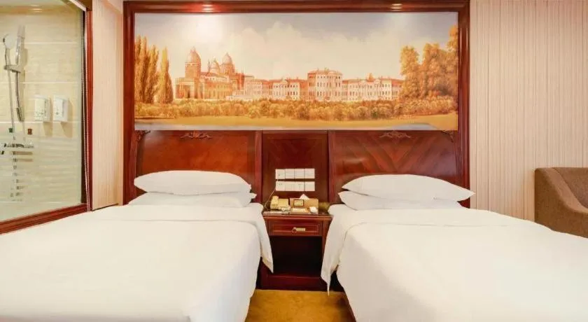 Bed in Vienna Hotel Nanning Train Station