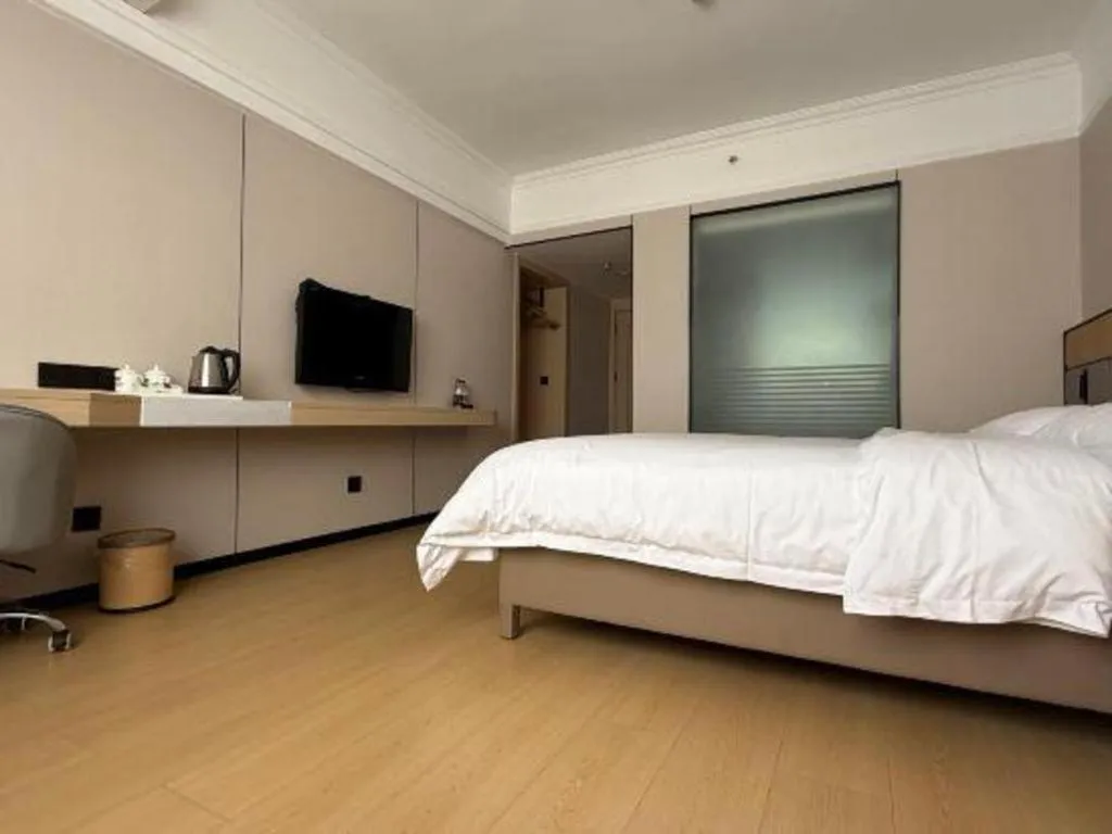 Bed in Vienna Hotel Nanning Train Station