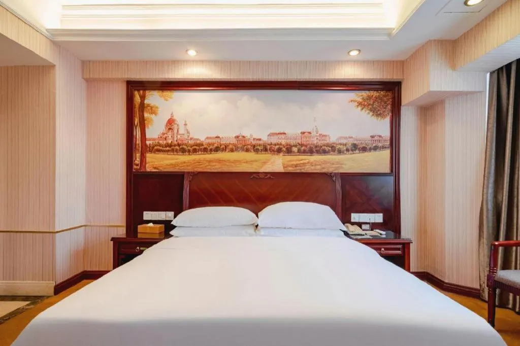 Bed in Vienna Hotel Nanning Train Station