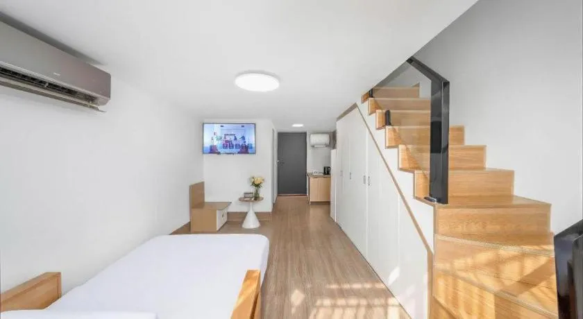 Bed in Vienna Hotel Nanning Train Station