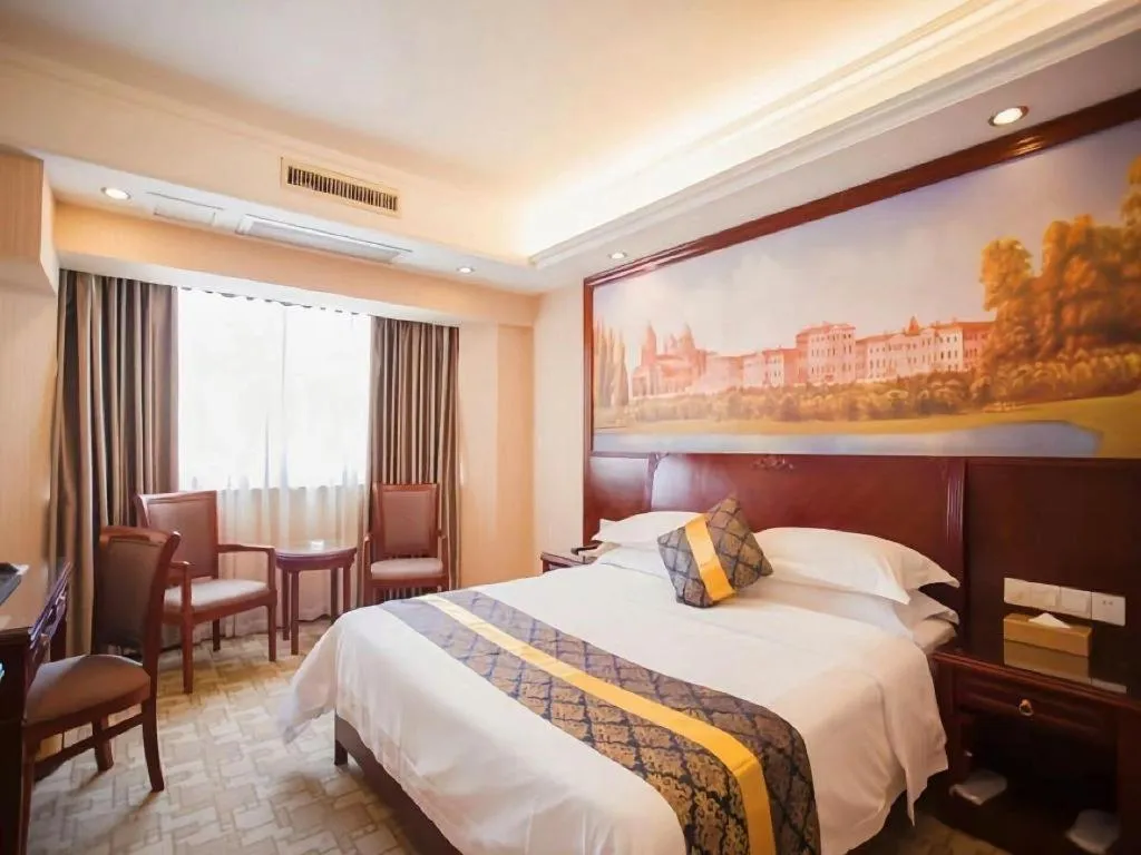 Bed in Vienna Hotel Nanning Train Station