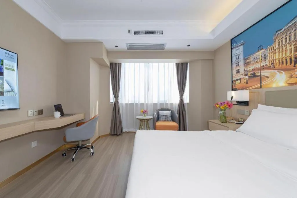 Bed in Vienna Hotel Nanning Train Station