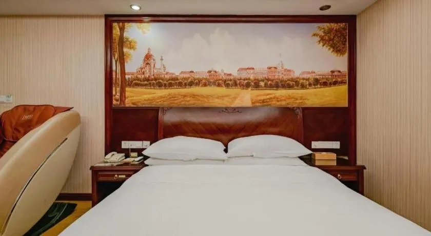 Bed in Vienna Hotel Nanning Train Station