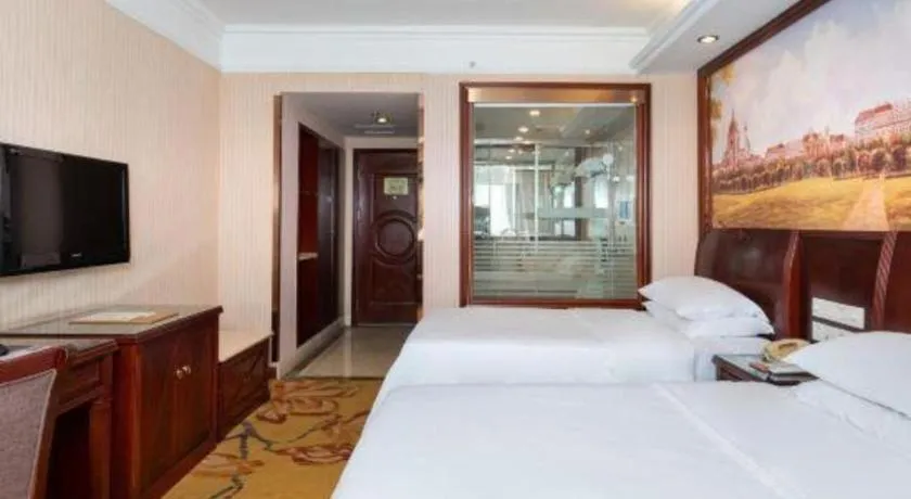 Bed in Vienna Hotel Nanning Train Station