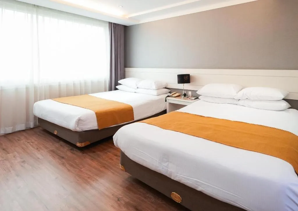 Bed in Galaxy Hotel